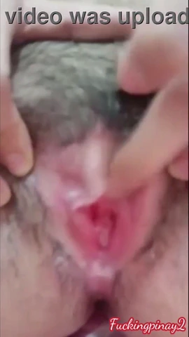 Horny Pinay can't resist fingering herself to orgasm. Watch as she strokes her sweet spot with intense pleasure, leading to a satisfying release of cum.